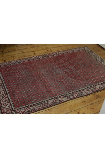A Small Oriental Carpet