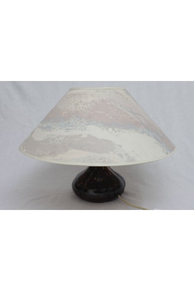 A cast lamp with 90s Shade